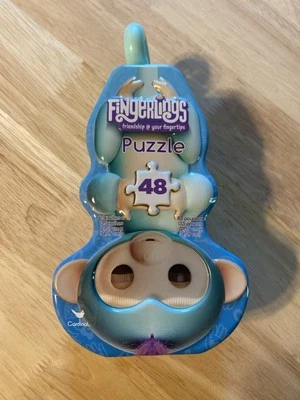 Rompecabezas Fingerlings Mono en Caja de Metal Lata con Cola 48 Piezas Rompecabezas COMO NUEVO Foto 1 de 3