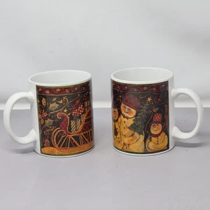 Set Of 2 Susan Winget Certified International Holiday Mugs With Snowman & Sleigh - Picture 1 of 11