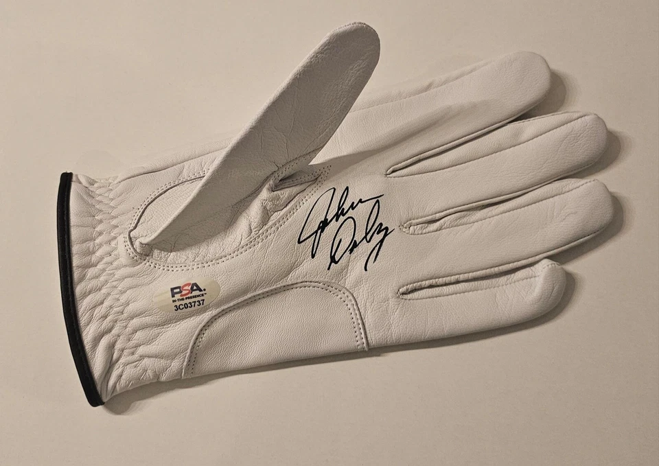 GUANTE DE GOLF JOHN DALY PGA 2X GANADOR IMPORTANTE FIRMADO LOGOTIPO DE LEÓN CERTIFICADO DE AUTENTICIDAD PSA Foto 1 de 3