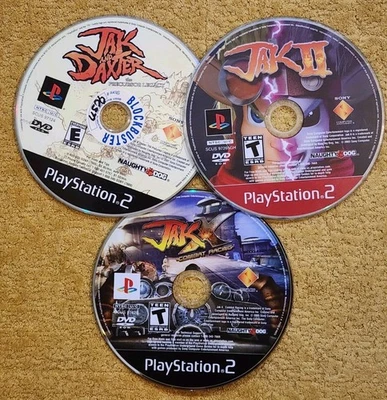 Lot of 3 PS2 Jak & Daxter Precursor, Jak II, Jak X Combat Racing, PS2 DISC ONLY  - Image 1 of 4