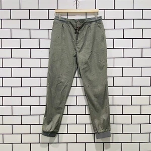 PANTALÓN PUÑO STAPLE LUX GRIS - Imagen 1 de 6