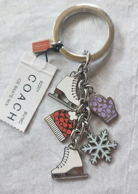 Llavero/anillo Coach tono plata patinaje invierno copo de nieve esmalte plata derramado Foto 1 de 4