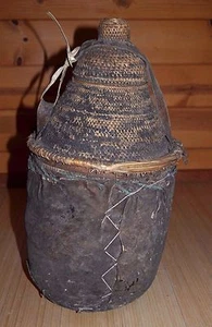 Cesta antigua de fibra tejida etíope y jarra de leche de cuero cesta Etiopía África - Imagen 1 de 4