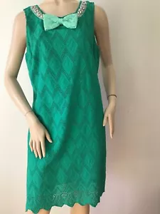 Vestido Dolce & Gabbana verde adornado con lazo (talla 46)-$4995,00 - Imagen 1 de 12