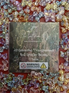 COLOURFUL TRANSPARENT BOW SPACER BEADS 11MM JEWELLERY MAKING CRAFTS FREE POSTAGE - Picture 1 of 4