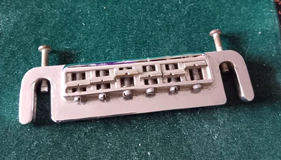 Puente envolvente Leo Quan Badass original vintage "Pat. Aplicado para" Foto 1 de 2