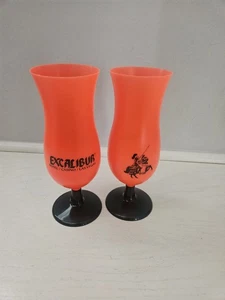 Las Vegas Excalibur Cocktail Glass Set Of 2 Orange Plastic Glasses - Picture 1 of 5