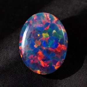 AAA+ Cabujón de ópalo de seda negro 12x10 mm 2 quilates piedra preciosa suelta de fuego - Imagen 1 de 5