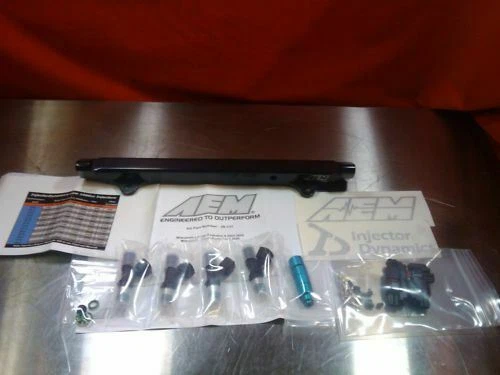Honda B18 AEM Fuel Rail 25-100BK and Injector Dynamics ID1050x Injectors 1050cc - Image 1 of 1