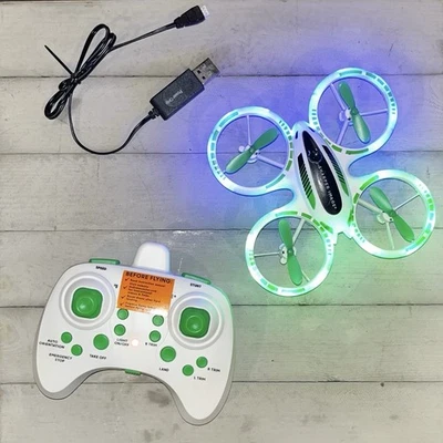 Sharper Image Glow Stunt Drone Rechargeable 2.4 GHz LED Quadcopter - 1012182 - Image 1 of 4