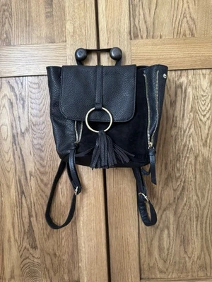 Primark Black Faux Leather Small Rucksack. Stitching On Front. - Image 1 of 3