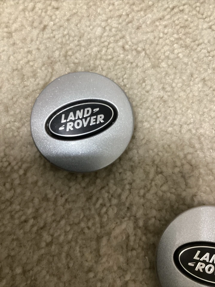 Tapa central Land Rover LR2 LR3 2005-2016 OEM PLATEADA negra #RRJ500030xxx 1 pieza Foto 1 de 4