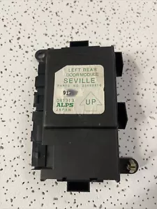 1998-2004 SEVILLE Left Driver Rear Back Door Control Module Multi function BODY - Picture 1 of 3