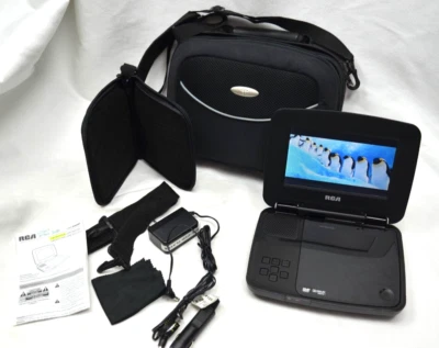 Портативный DVD-плеер RCA DRC99371EB - 7-дюймовый экран с зарядными устройствами кабелями и чехлом - рабочий - Изображение 1 из 4