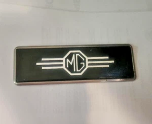 DE COLECCIÓN 62-76 MGB MGA 66-72 RADIO ENANA PLACA BORRADORA CON EMBLEMA Y ENVOLVENTE - Imagen 1 de 3
