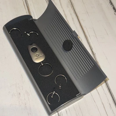 Linterna llavero desmontable vintage Samsonite de 5 anillos y estuche de almacenamiento Foto 1 de 3