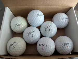 8 Used Titleist Golf Balls - Picture 1 of 1
