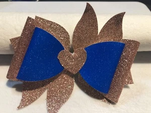 MOÑO DE PELO PINWHEEL. 3 CAPAS, DORADO Y AZUL, 4" X 4,5". HOMECHO - Imagen 1 de 3