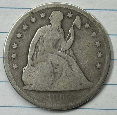 Dólar libertad sentada 1860-O sin lema AG Foto 1 de 2