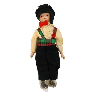 Muñeca de Navidad de porcelana inglesa antigua de colección niño sombrero negro arco rojo Foto 1 de 2