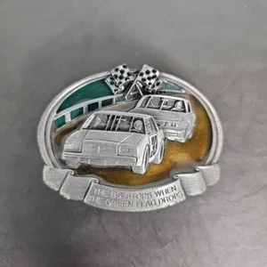 1984 BERGAMOT BELT BUCKLE BS STOPS WHEN THE GREEN FLAG DROPS BRASS USA Enamle - Picture 1 of 6