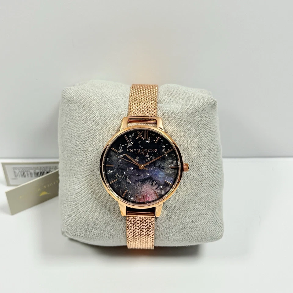 Reloj para mujer Olivia Burton esfera celeste oro rosa malla Boucle OBW0651 Foto 1 de 4