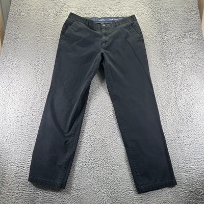 Pantalón chino recto elástico de algodón negro 34x34 Izod Advantage Performance para hombre Foto 1 de 4