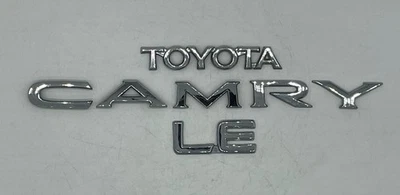 1992 - 1996 TOYOTA CAMRY LE CHROME REAR TRUNK LID EMBLEM BADGE SYMBOL NAMEPLATE - Imagem 1 de 4