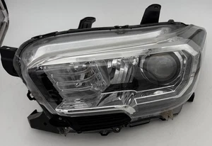 2016-2021 Toyota Tacoma Left Driver Headlight Halogen w/DRL OEM - Picture 1 of 21