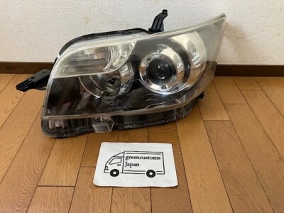 Luz principal izquierda JDM Toyota Rumion Scion Bb Xb ZRE152 NZE151 HID usada Foto 1 de 4