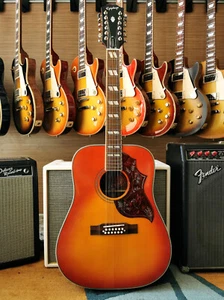 Epiphone Hummingbird 12-String all Solid 2024 - Aged Cherry Sunburst Gloss - Picture 1 of 10