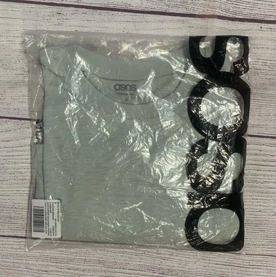 Camiseta de gran tamaño caqui lavado con estampado trasero pequeña de ASOS Foto 1 de 3