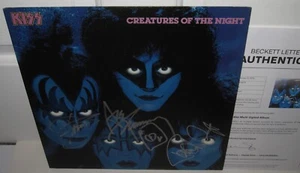 KISS SIGNED CREATURES OF THE NIGHT ALBUM GENE SIMMONS AUTOGRAPH BECKETT LOAX3 - Picture 1 of 7