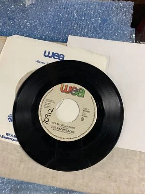 RAZORBACKS It’s Saturday night/just the short of crying WEA 45 - Image 1 of 4