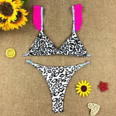 Bikini con volant a triangolo costume regolabile slip tanga fucsia bianco nero - Immagine 1 di 4