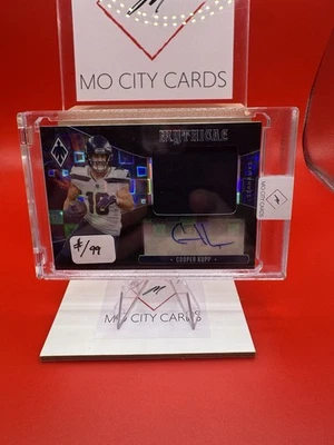 2025 Panini Phoenix COOPER KUPP  Mythical Patch Auto /99 - SEAHAWKS - Image 1 of 3