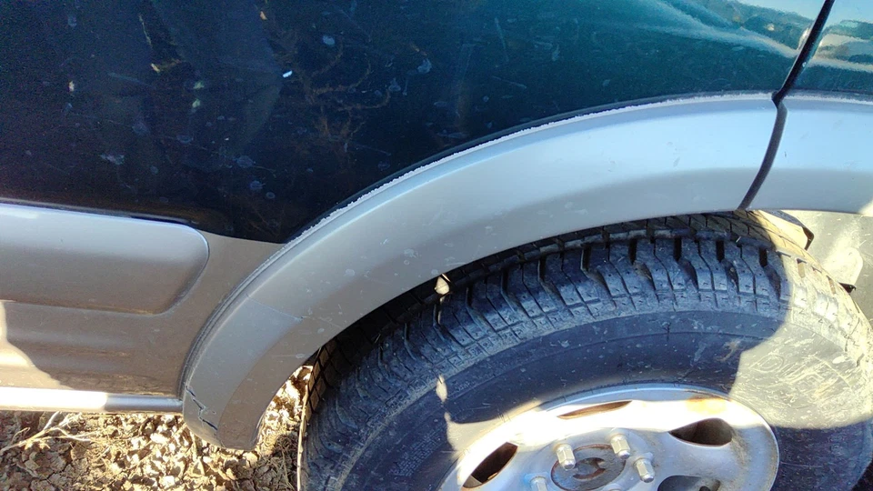 Honda Passport 2000 conductor trasero izquierdo llamarada moldura en puerta fabricante original izquierda Foto 1 de 4