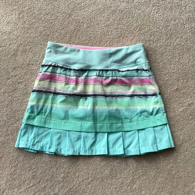 IVIVVA NIÑA SKORT, 14, PLISADO EN EL DOBLADILLO, RAYAS, PEQUEÑO BOLSILLO CON CREMALLERA CERCA DE LA CINTURA TRASERA Foto 1 de 3