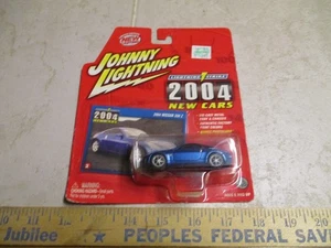 Nissan 350Z Lightning 2004 Johnny Lightning Strike 1:64 diecast nuevo LE azul - Imagen 1 de 6