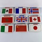Lot of 9 Country Pinback Walt Disney Flag Mexico Japan Italy Canada France Norwa
