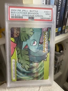 PSA 9 2004 Pokémon e-Battle Leaf Green Venusaur Bug Catcher Brandon - Foto 1 di 2