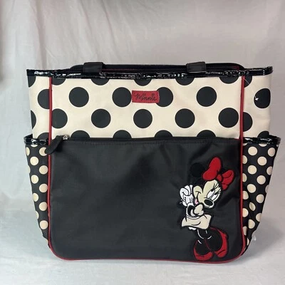 Bolsa de pañales Disney “Minnie Mouse” negra y crema a lunares con almohadilla cambiadora y correa Foto 1 de 4