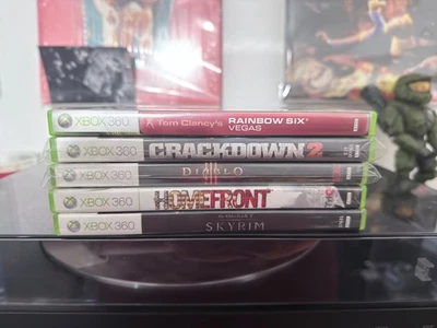 Xbox 360 Game Lot: Skyrim, Diablo III, Rainbow Six Vegas, Crackdown 2, Homefront - Image 1 of 3