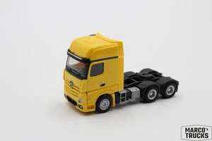 Tractora Herpa MB Actros 11 Giga 3 ejes 6x4 amarillo/negro 1:87/H23927 - Imagen 1 de 1