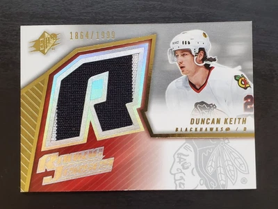 2005-06 SPX Duncan Keith Rookie Jersey Patch 1864/1999 #133 Chicago Blackhawks - Image 1 of 3