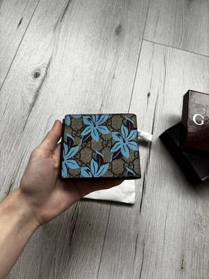 Cartera de Lona Gucci Floral GG Supreme - Estampado de Orquídea Azul - Doble Pliegue Foto 1 de 4