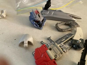 MIXED BAG OF TRANSFORMER PARTS UNSURE OF WHO THEY BELONG TO - Picture 1 of 4