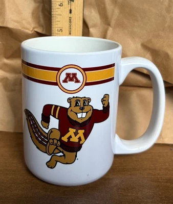 TAZA DE CAFÉ DE TÉ DE LA UNIVERSIDAD DE MINNESOTA GOLDEN GOPHERS GOLDY COLLEGE DE COLECCIÓN Foto 1 de 3