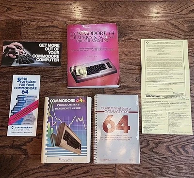 Lot Of 3 Commodore 64 Books,  2 Store Pamphlets, And A Warranty Card - Image 1 of 4