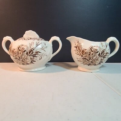 A J Wilkinson, Harvest Clarice Cliff azúcar y tapa y crema; marrón floral arremolinado Foto 1 de 4